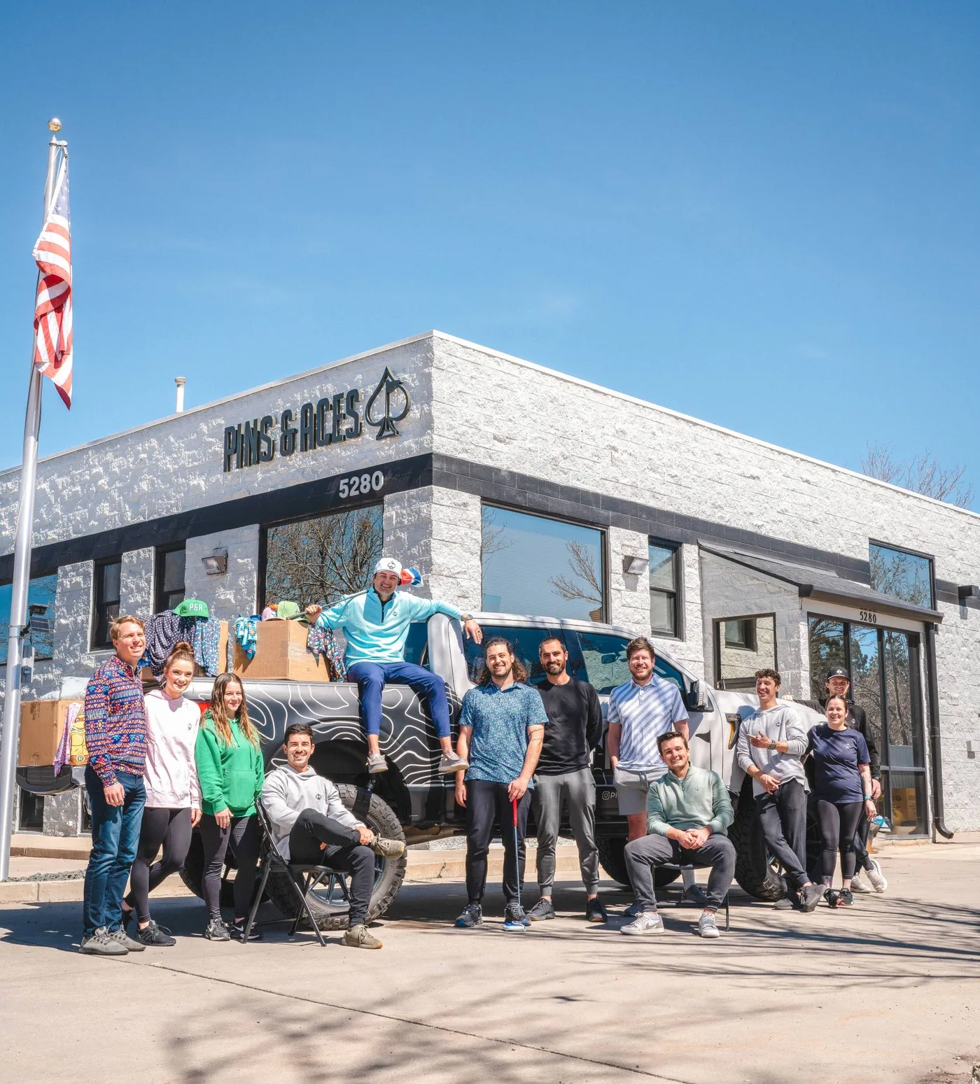 The Pins & Aces team outside the company storefront at 5280 Ward Drive in Arvada, Colorado