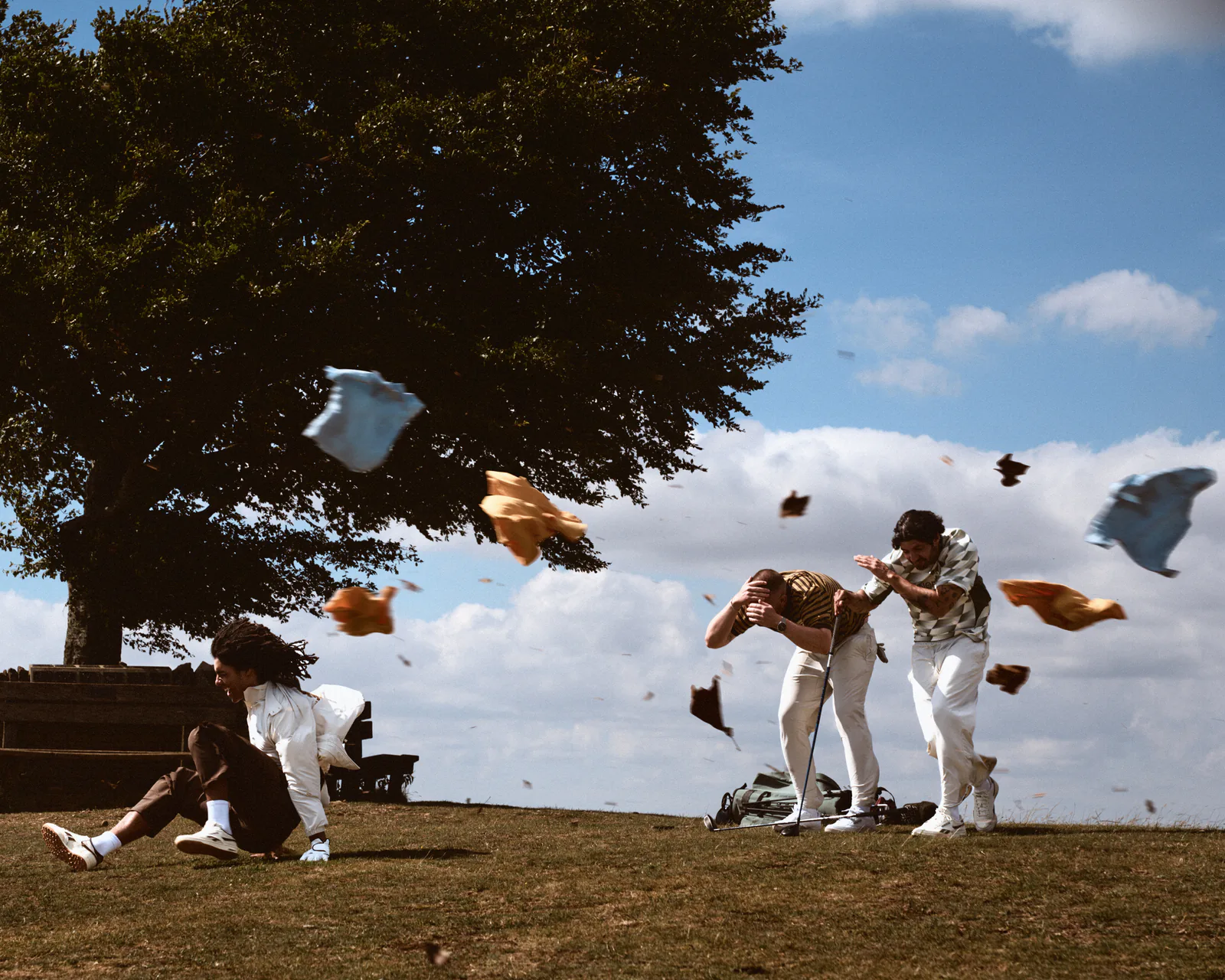 Group of golfers in Reebok x MANORS apparel during the United Kingdom of Golf campaign shoot.