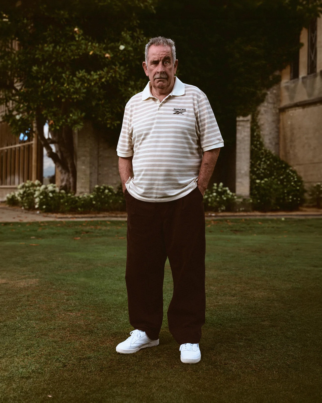Reebok x MANORS campaign image styled after vintage British golf imagery.