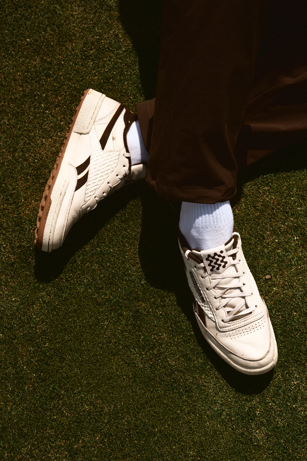 Close view of the Reebok x MANORS Club C Revenge Golf outsole tread pattern.