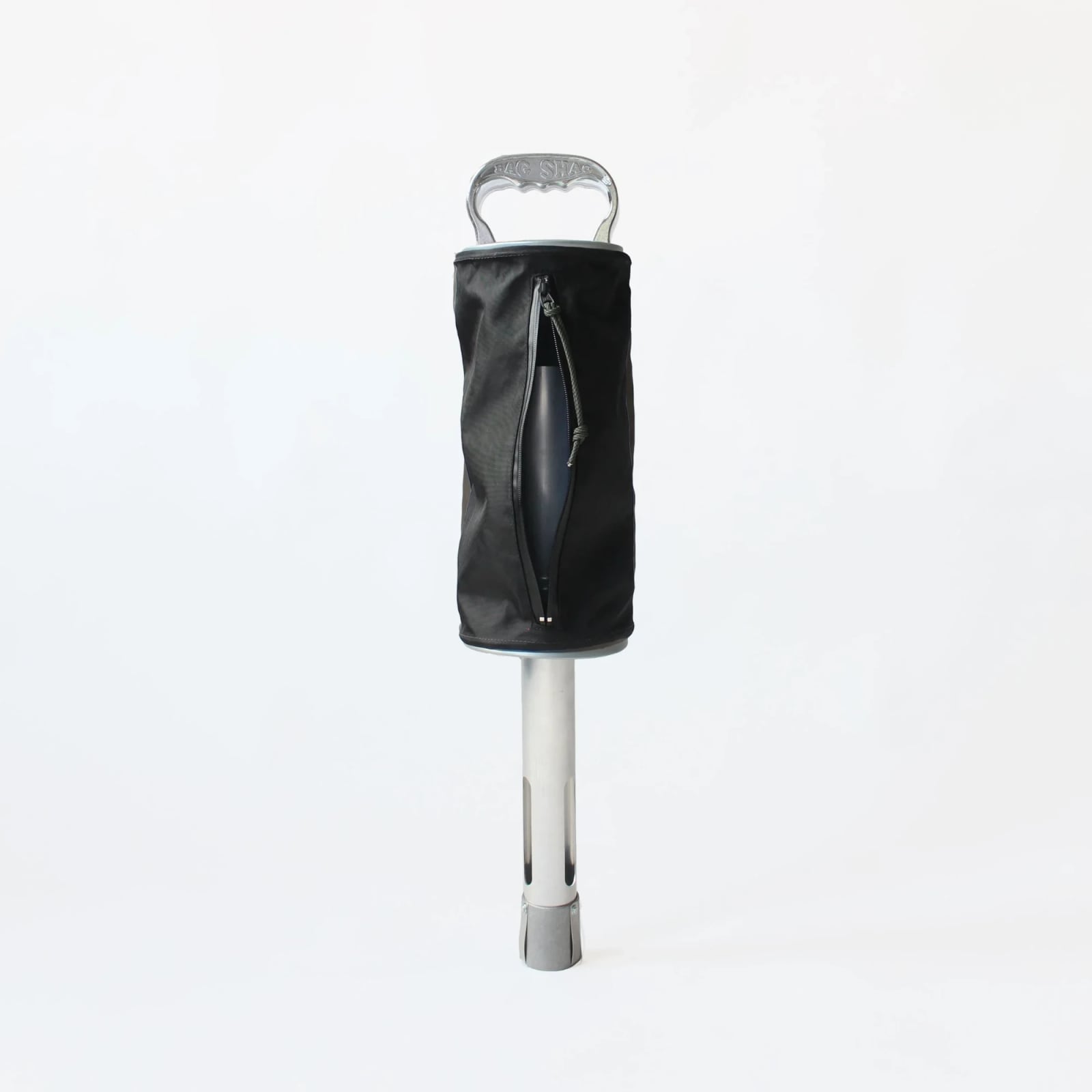 A Sentinel Golf shag bag: black fabric body with a side zip on an aluminium tube, under a cast Bag Shag handle